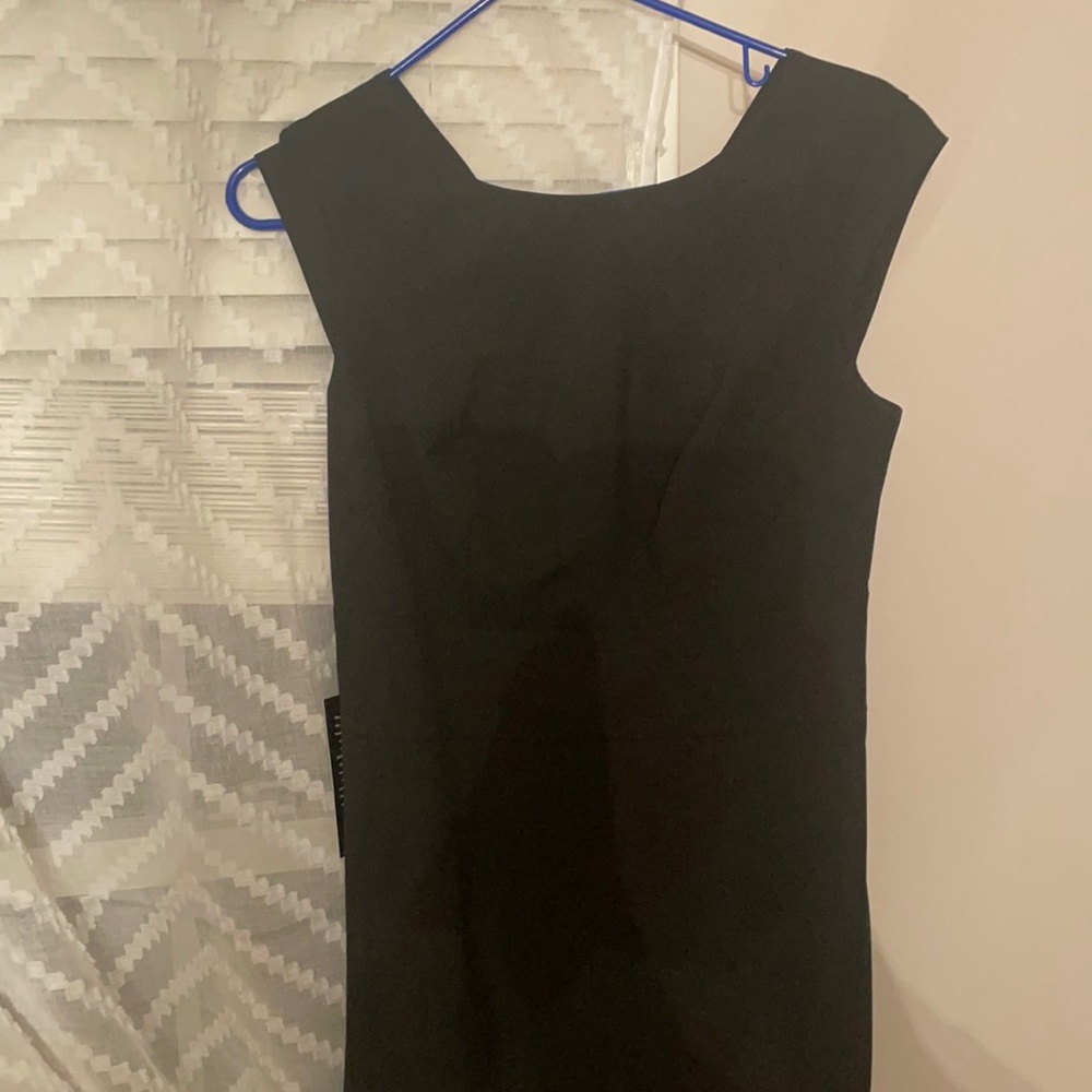 Formal black to the knee dress. Never worn